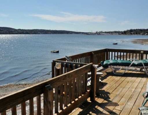 1345 Anthony Road Portsmouth, RI 02871 - Photo 5 of 12 Patio/Deck. Wood/coal stove off living area