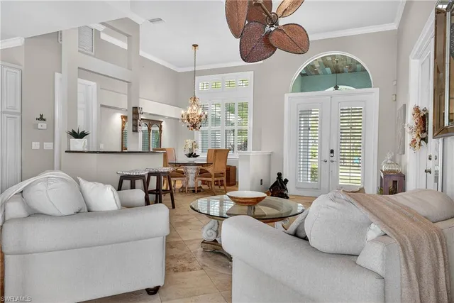 a kitchen with a table and chairs in it