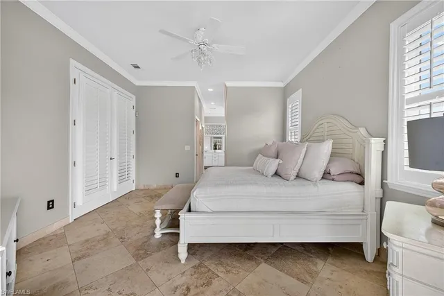 a bathroom with a granite countertop sink and a bathtub