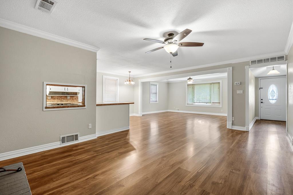 913 Pinson Road Forney, TX 75126 - Photo 8 of 19 View of both living spaces off of the kitchen.