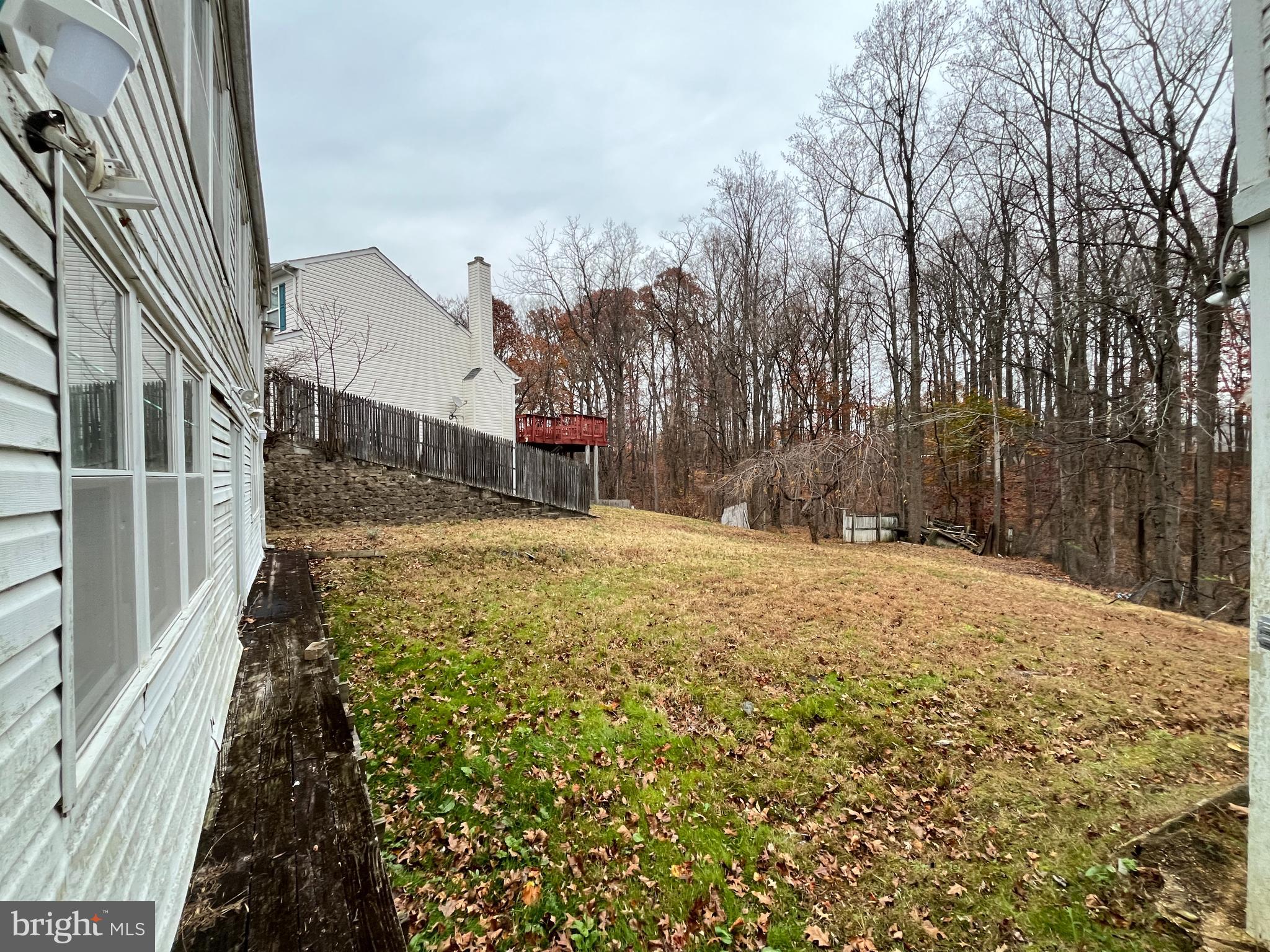 21 Greenbrush Court Windsor Mill, MD 21244 - Photo 14 of 76 a view of a yard with snow on the roadside