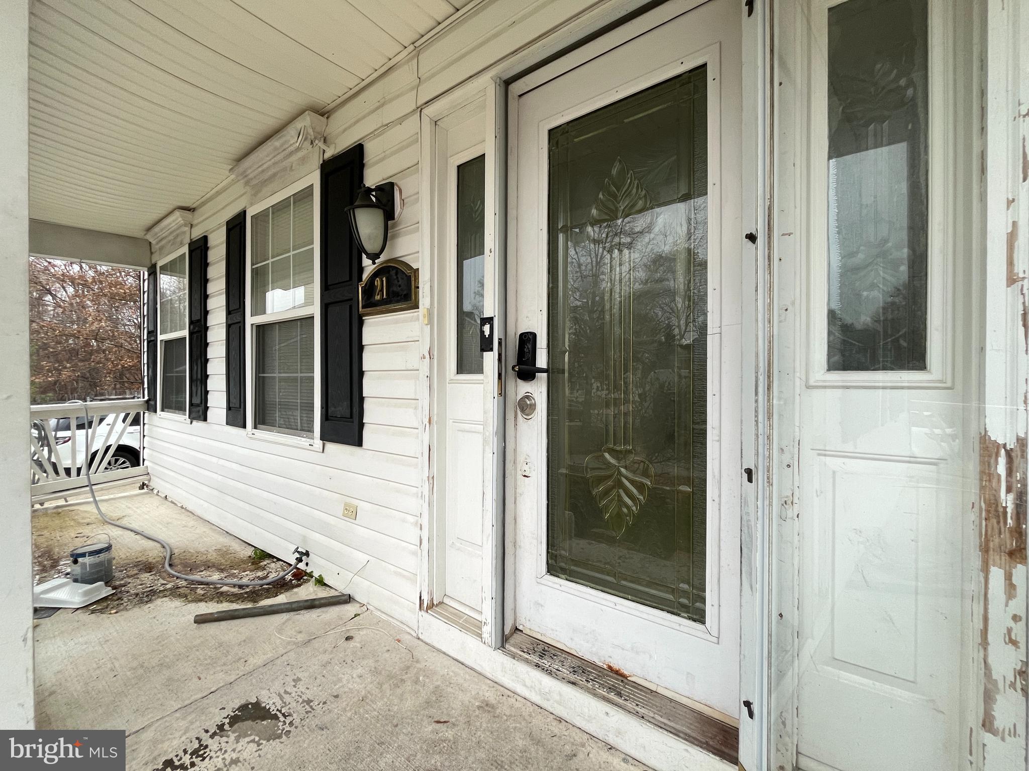 21 Greenbrush Court Windsor Mill, MD 21244 - Photo 4 of 76 a view of a entryway door front of house