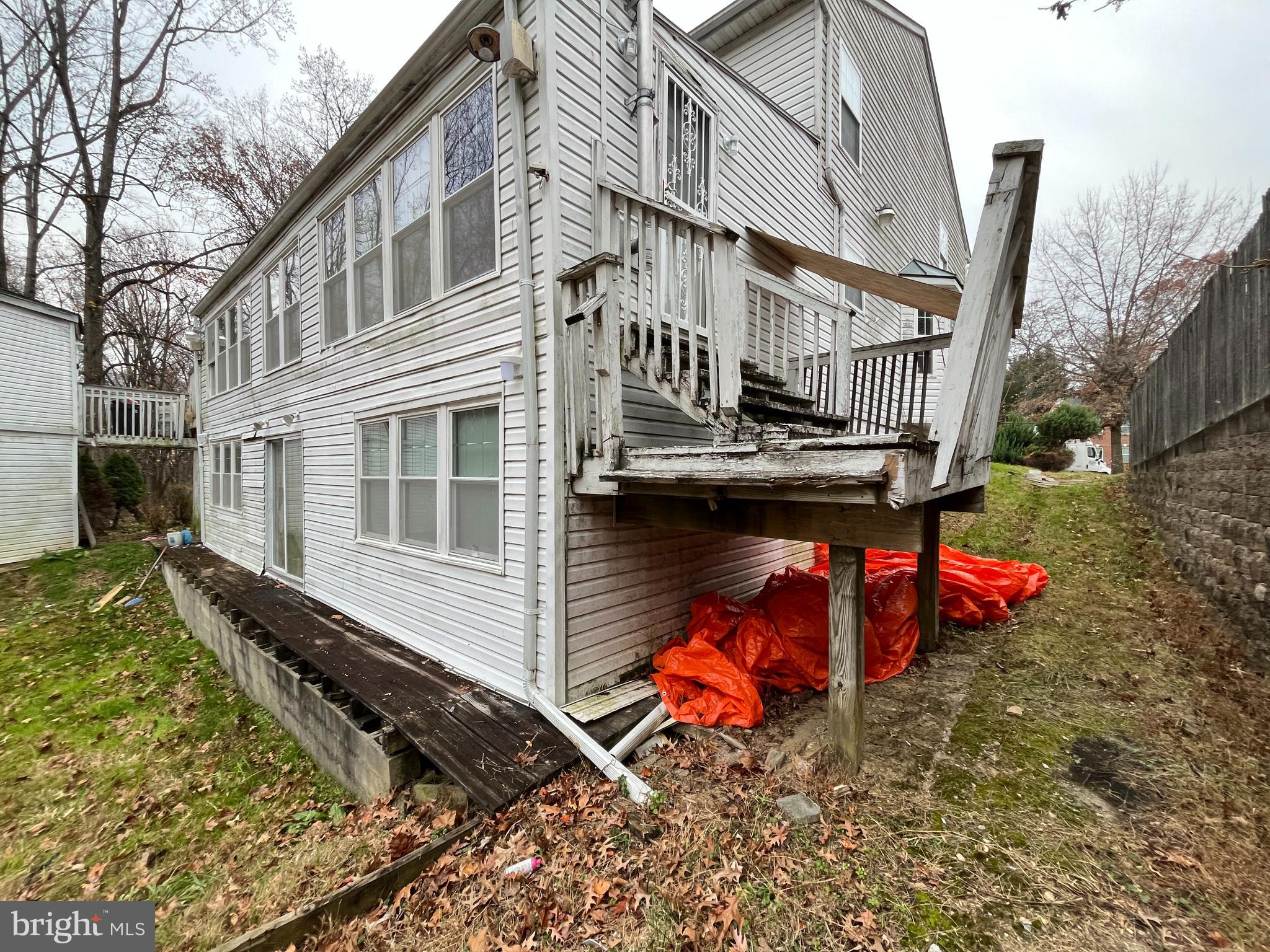 21 Greenbrush Court Windsor Mill, MD 21244 - Photo 8 of 76 a view of a house with backyard and sitting area