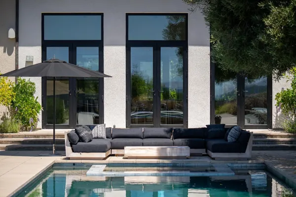 a building outdoor space with patio furniture