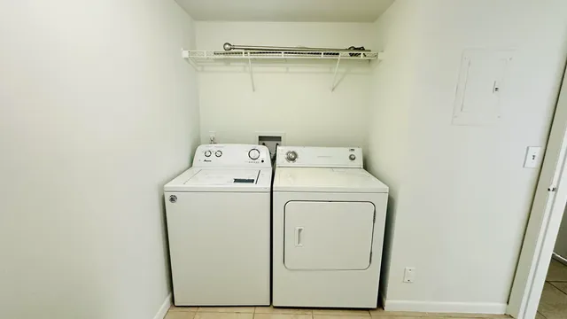 a utility room with dryer and washer