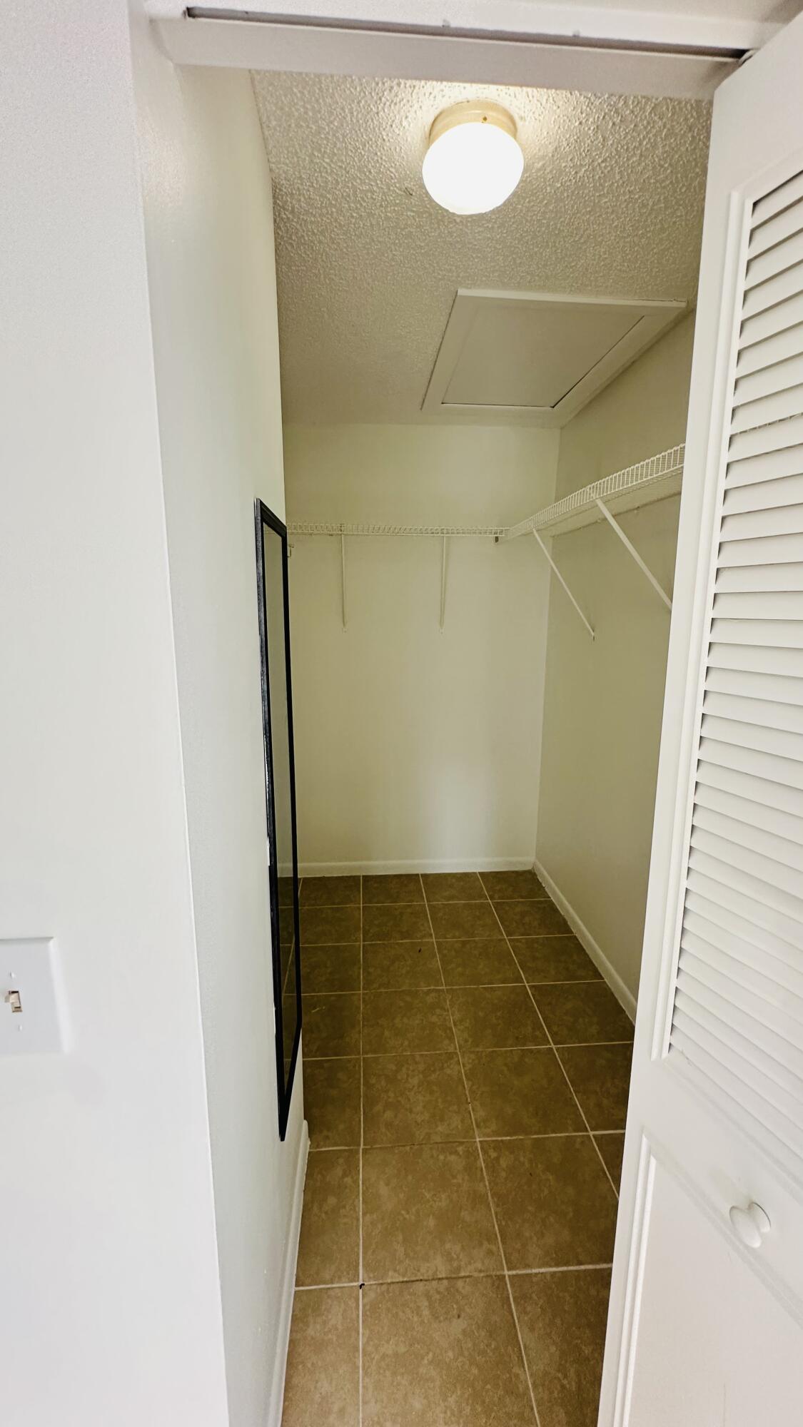 1006 Green Pine Boulevard, Unit H2 West Palm Beach, FL 33409 - Photo 10 of 12 a bathroom with a shower
