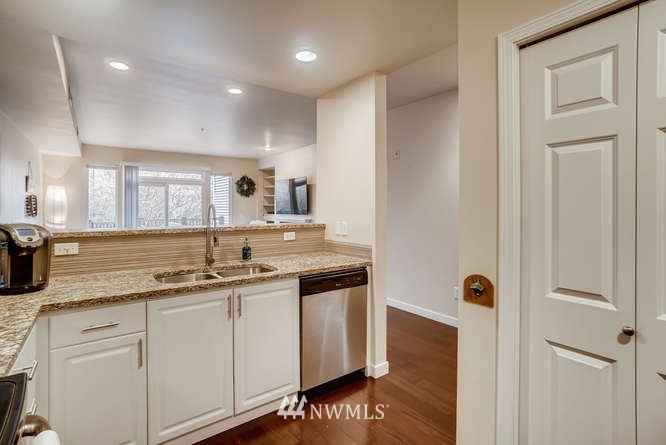 21624 9th Avenue Southeast, Unit D104 Bothell, WA 98021 - Photo 8 of 16 a kitchen with a sink and cabinets