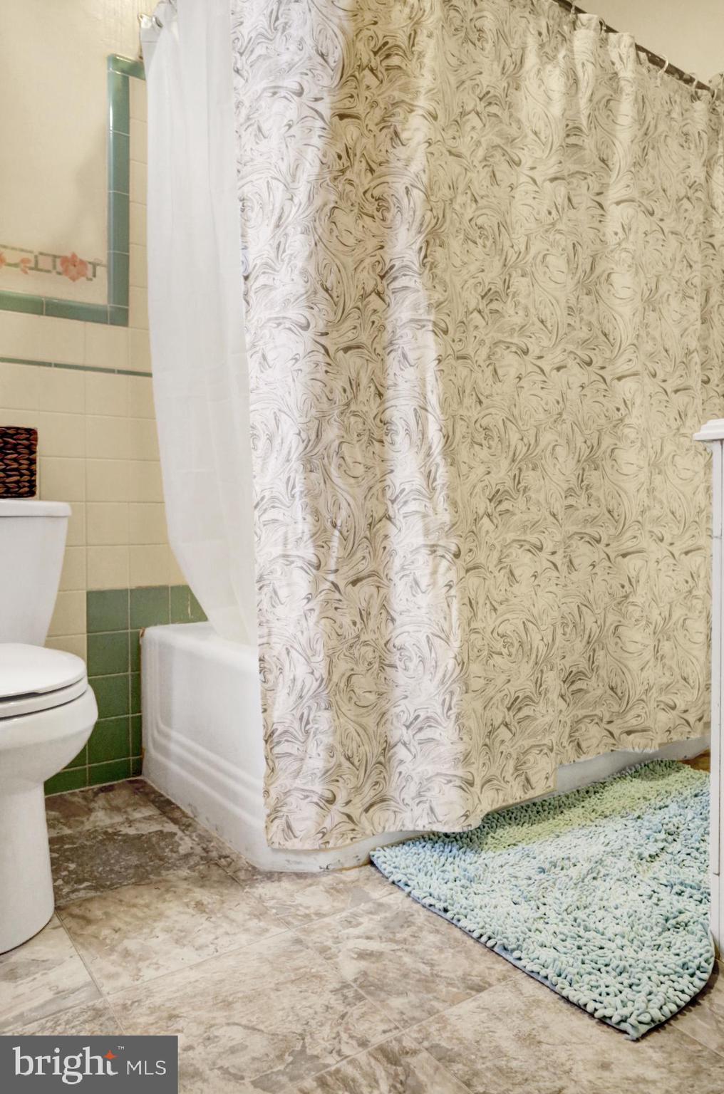 230 South 18th Street Reading, PA 19602 - Photo 15 of 24 a bathroom with a toilet and a shower