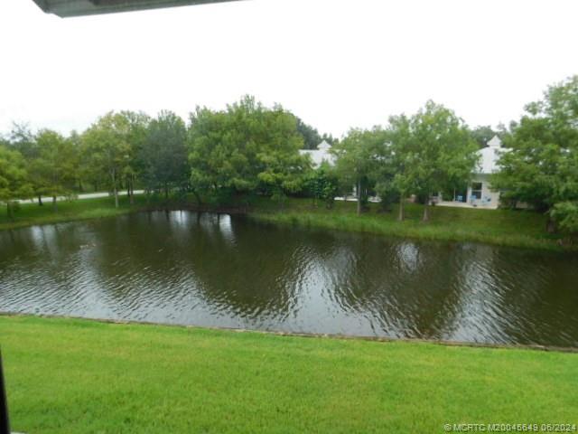 2273 Northwest 22nd Avenue, Unit 104 Stuart, FL 34994 - Photo 3 of 17 a view of a lake