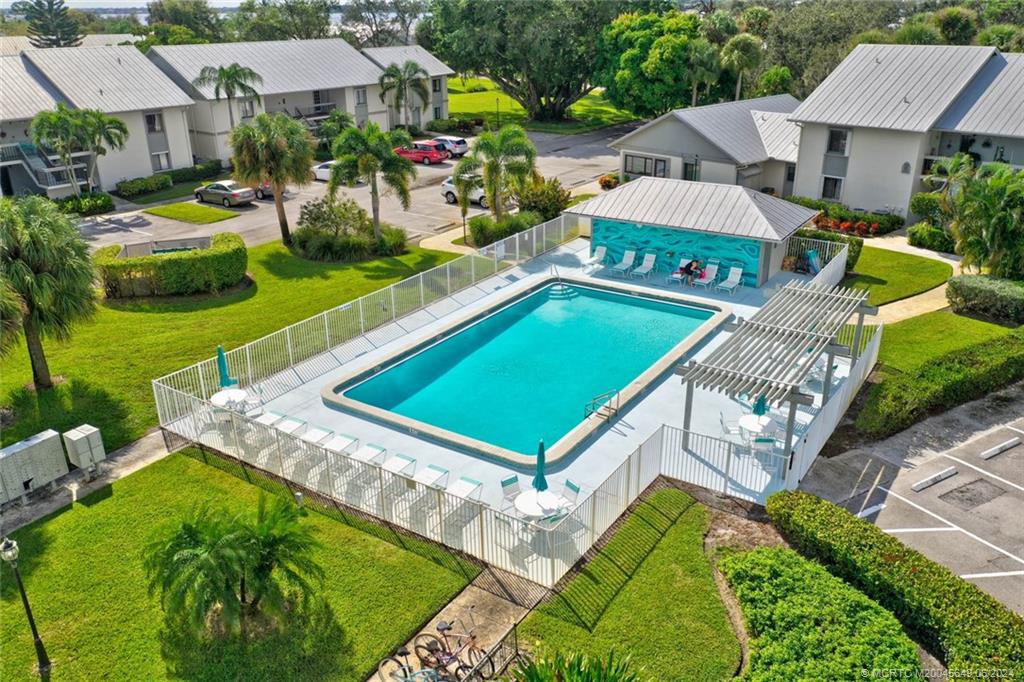 2273 Northwest 22nd Avenue, Unit 104 Stuart, FL 34994 - Photo 4 of 17 an aerial view of a house