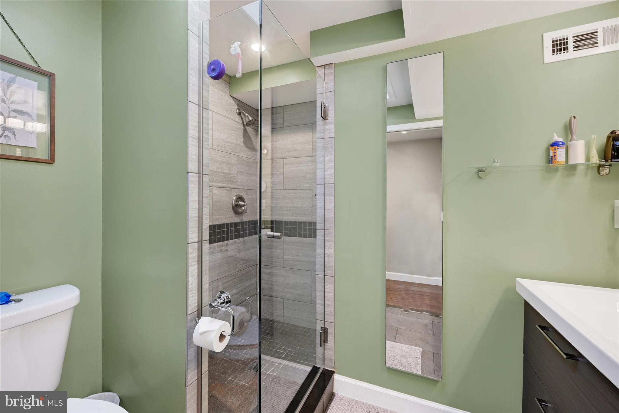 1436 Andre Street Baltimore, MD 21230 - Photo 18 of 35 a bathroom with a shower and a toilet