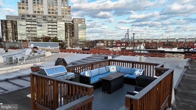 a view of balcony with furniture
