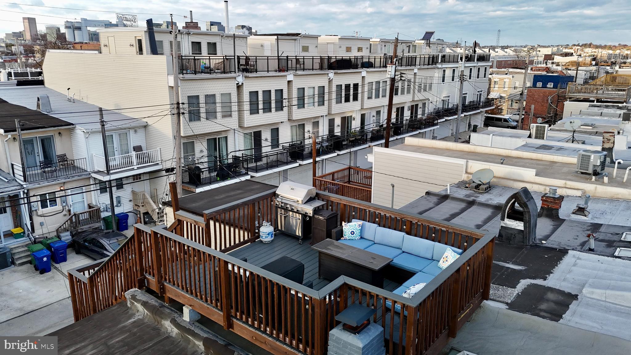 1436 Andre Street Baltimore, MD 21230 - Photo 25 of 35 a view of a balcony with two chairs and a deck