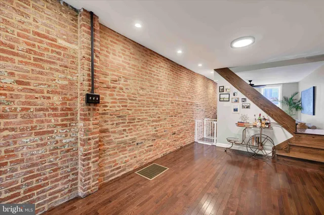 a view of entryway with wooden floor