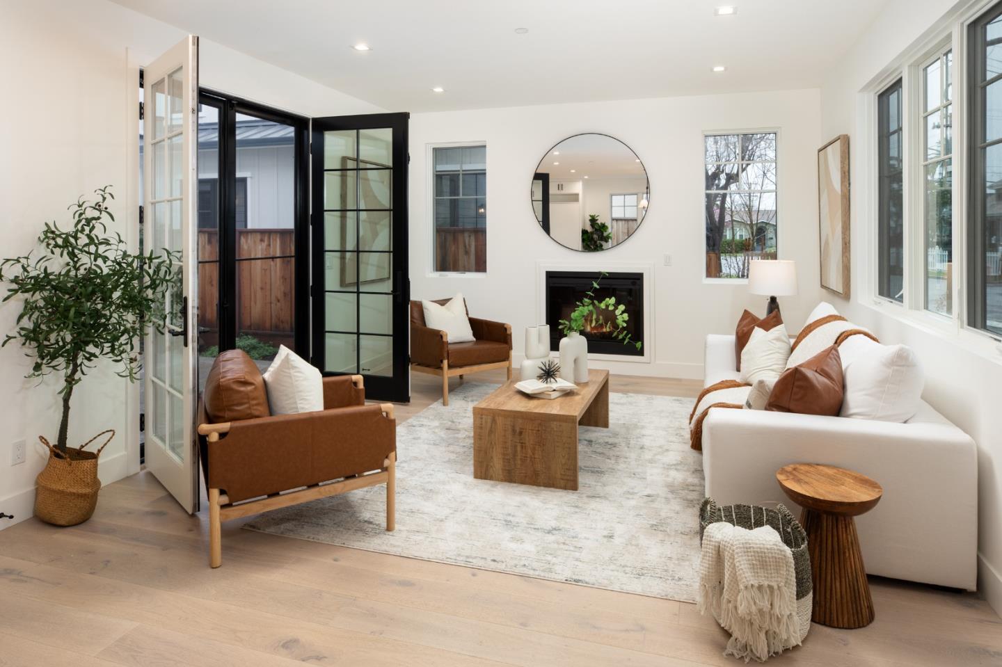 737 Linden Avenue Burlingame, CA 94010 - Photo 2 of 42 a living room with furniture and a large window