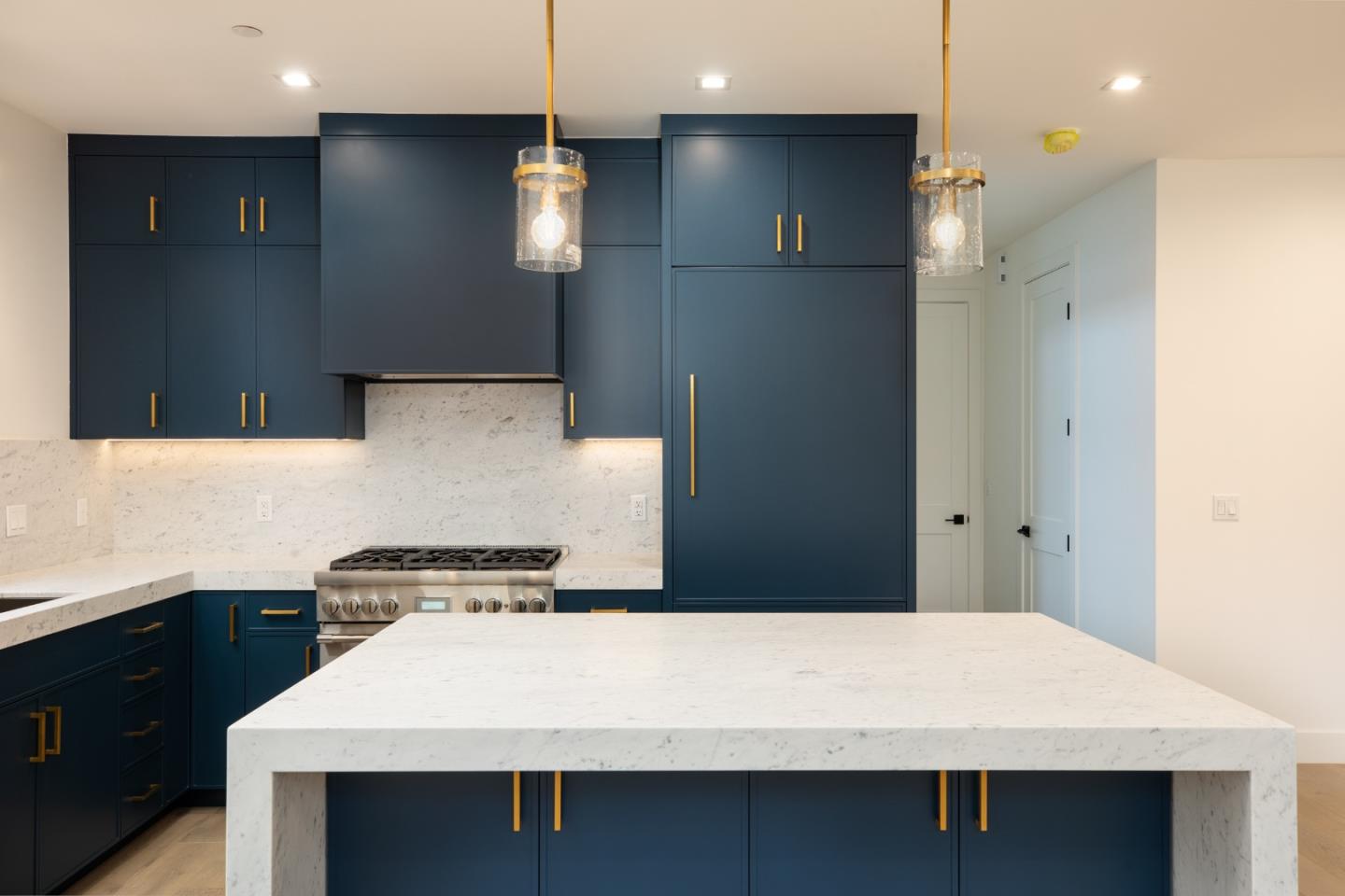 737 Linden Avenue Burlingame, CA 94010 - Photo 30 of 42 a view of kitchen with cabinets and wooden floor