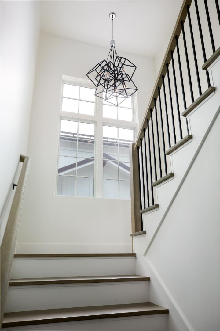 737 Linden Avenue Burlingame, CA 94010 - Photo 33 of 42 a view of staircase with wooden floor and white walls