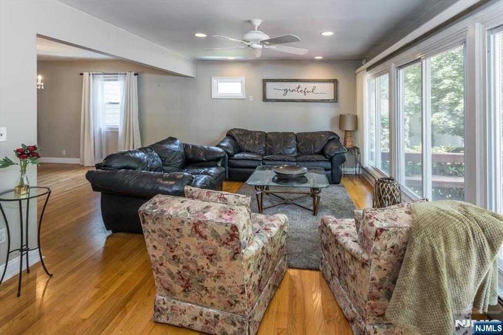 699 Kent Avenue Teaneck, NJ 07666 - Photo 11 of 31 a living room with furniture and a large window