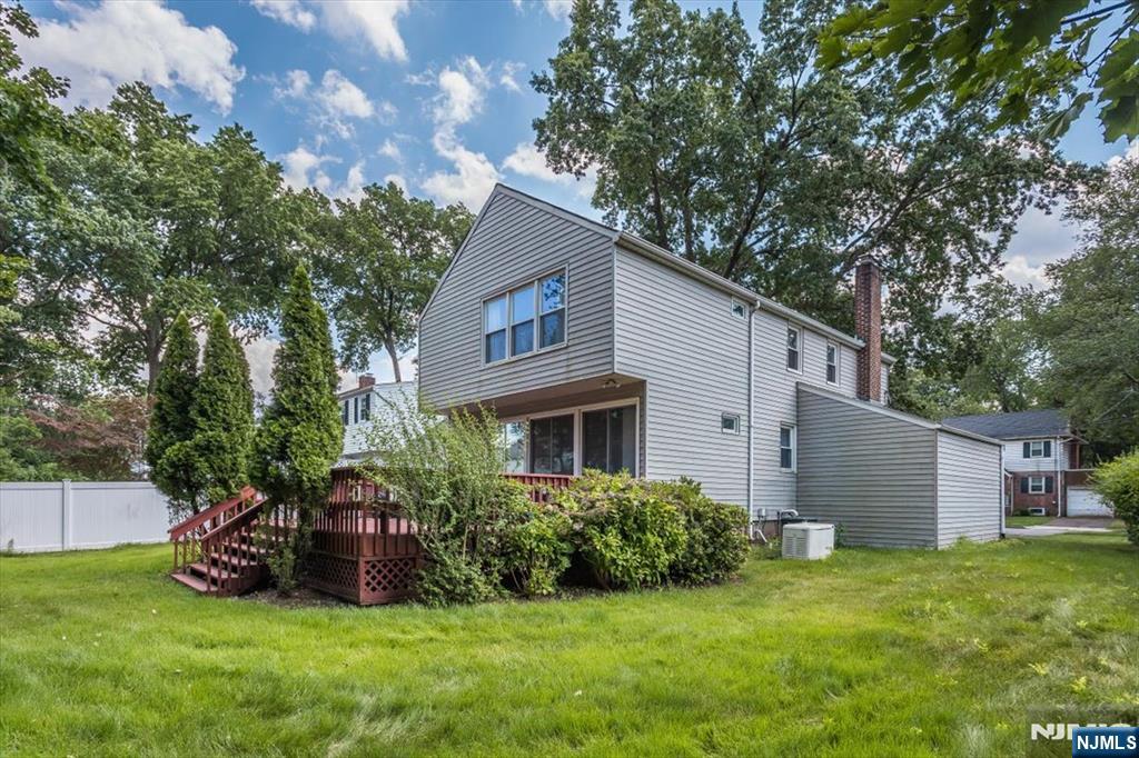 699 Kent Avenue Teaneck, NJ 07666 - Photo 27 of 31 a view of a house with backyard and garden