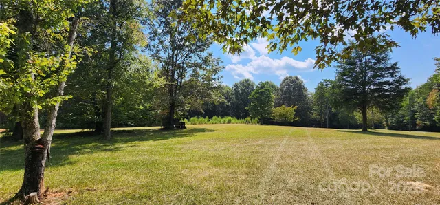 a view of swimming pool with an outdoor space and seating area