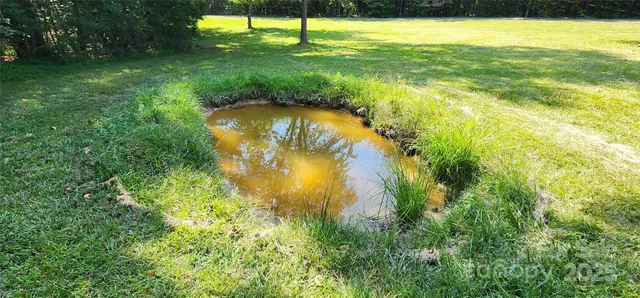 a view of outdoor space and yard