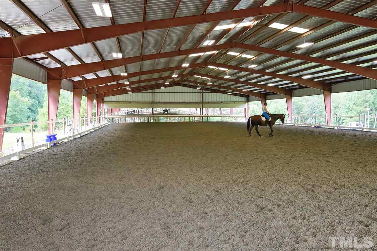 7012 Wildlife Trail Raleigh, NC 27613 - Photo 12 of 30 a view of a room with wooden ceiling