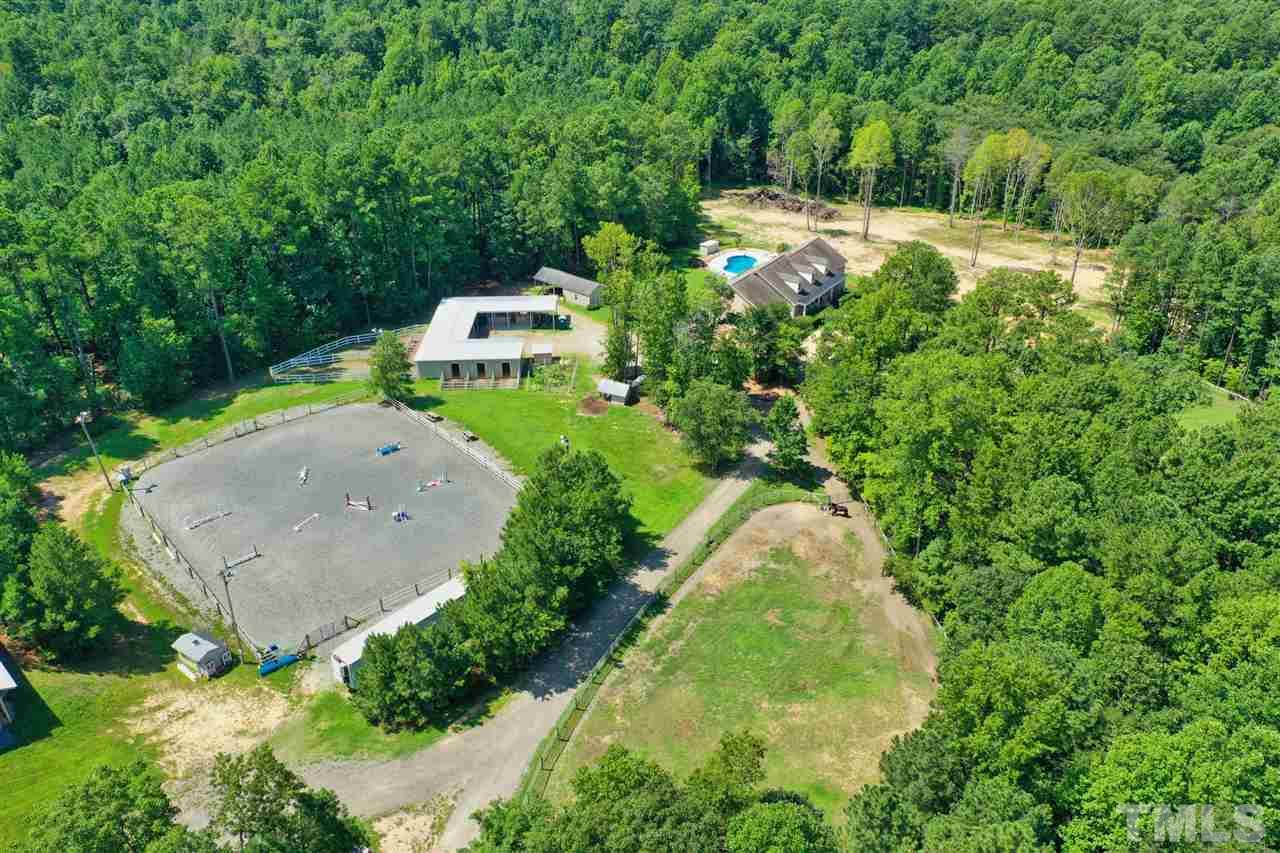 7012 Wildlife Trail Raleigh, NC 27613 - Photo 14 of 30 an aerial view of a house with a yard and trees