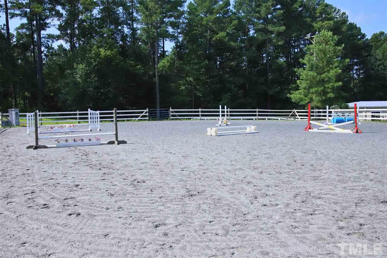 7012 Wildlife Trail Raleigh, NC 27613 - Photo 15 of 30 a view of a yard with wooden fence