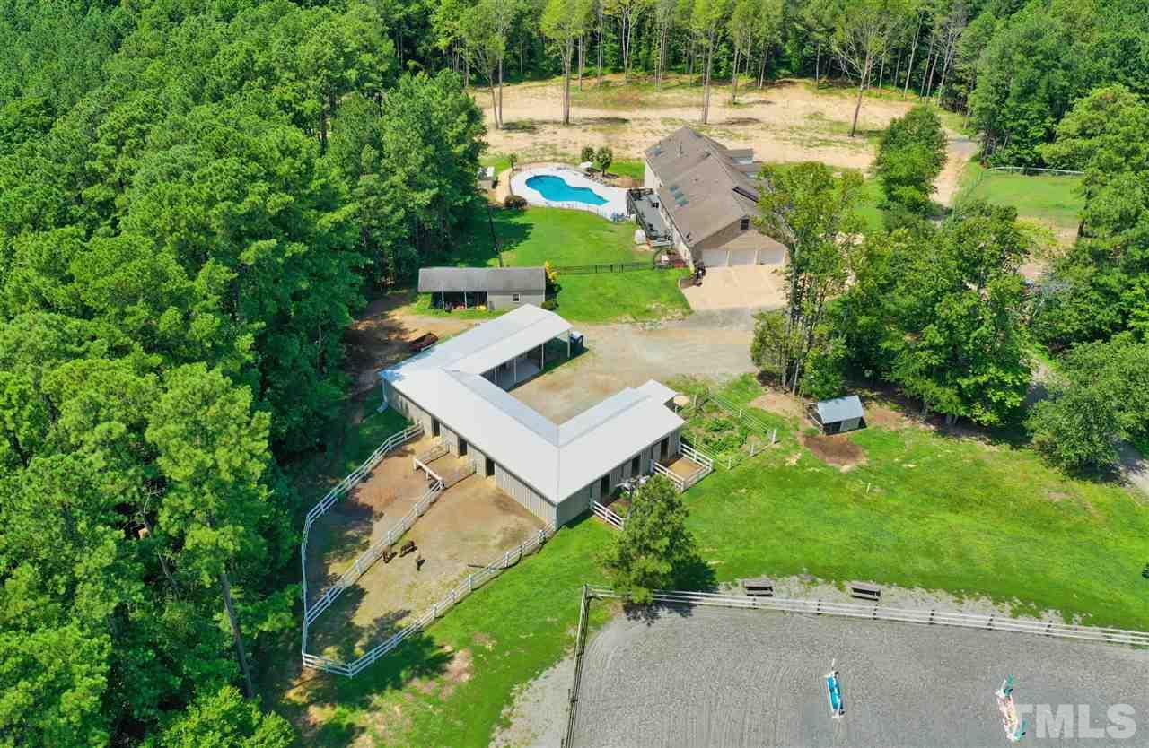 7012 Wildlife Trail Raleigh, NC 27613 - Photo 16 of 30 an aerial view of a house with a yard basket ball court and outdoor seating