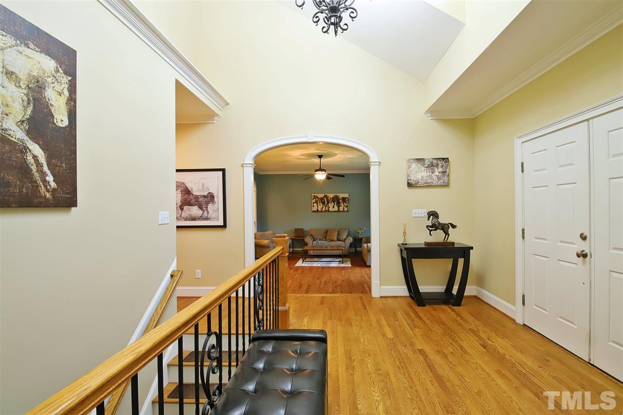 7012 Wildlife Trail Raleigh, NC 27613 - Photo 19 of 30 a view of a livingroom with wooden floor and furniture