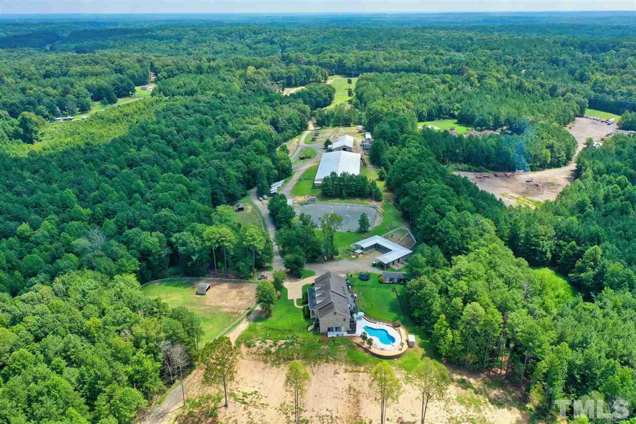 7012 Wildlife Trail Raleigh, NC 27613 - Photo 30 of 30 an aerial view of residential houses with outdoor space and trees