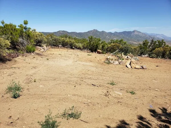 a view of mountain view with mountains in the background