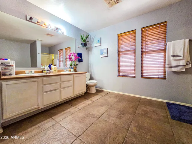 a room with a window and washer