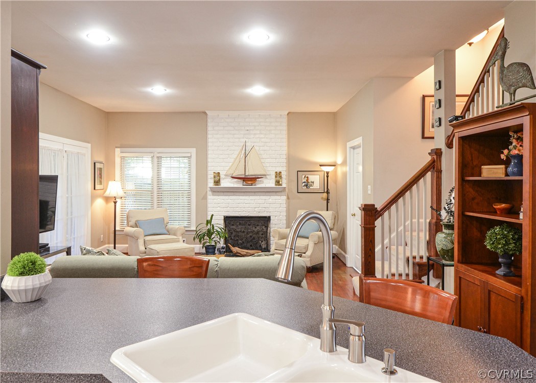 5329 Sylvan Road Richmond, VA 23225 - Photo 12 of 34 Kitchen, breakfast bar, looking into the family ro