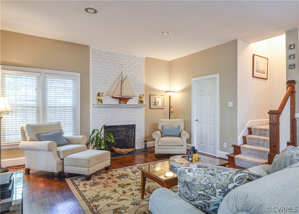 5329 Sylvan Road Richmond, VA 23225 - Photo 14 of 34 Family room with gas fireplace, rear staircase to