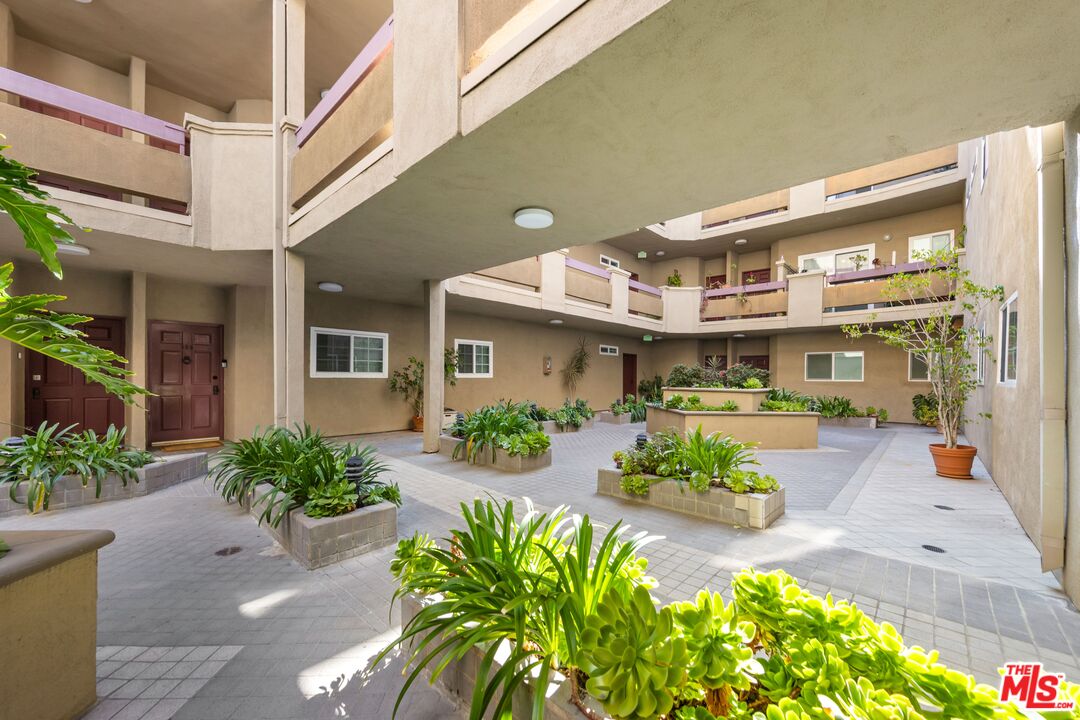 4301 Fulton Avenue, Unit 103 Sherman Oaks, CA 91423 - Photo 13 of 15 a front view of a multi story building