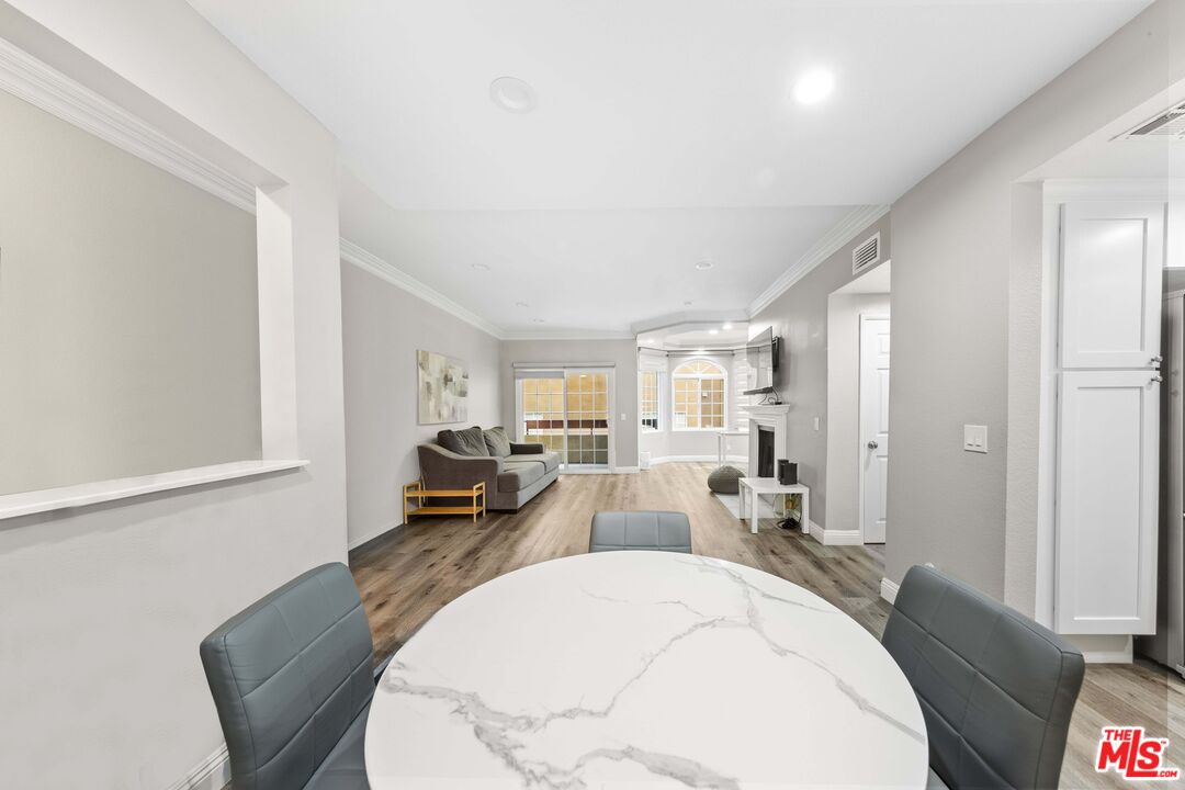 4301 Fulton Avenue, Unit 103 Sherman Oaks, CA 91423 - Photo 5 of 15 a view of a dining room with furniture