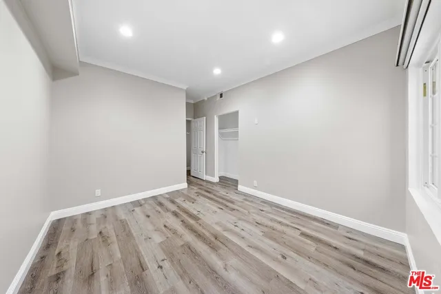 wooden floor in a hall with an entryway