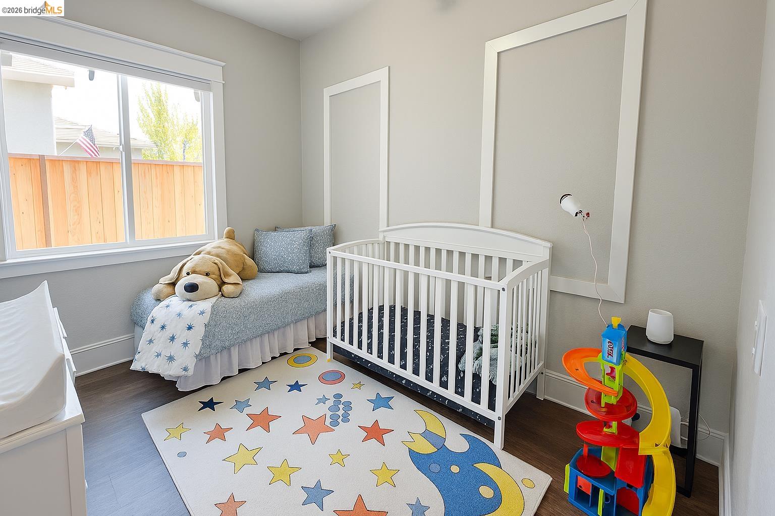2072 Bridgeport Loop Discovery Bay, CA 94505 - Photo 16 of 26 Bedroom featuring baseboards and wood finished floors