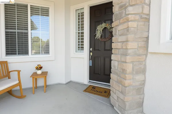a front view of a house with patio
