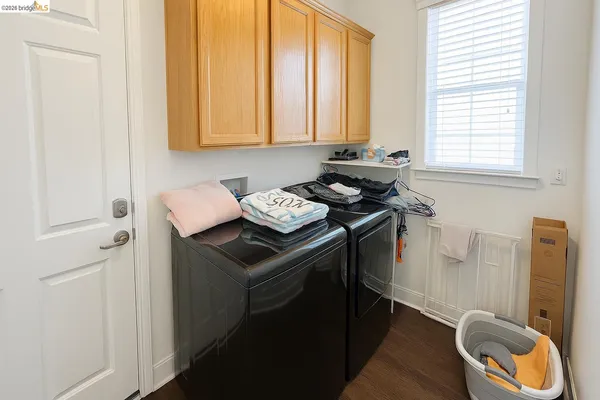 a view of a sink and dishwasher in a bathroom