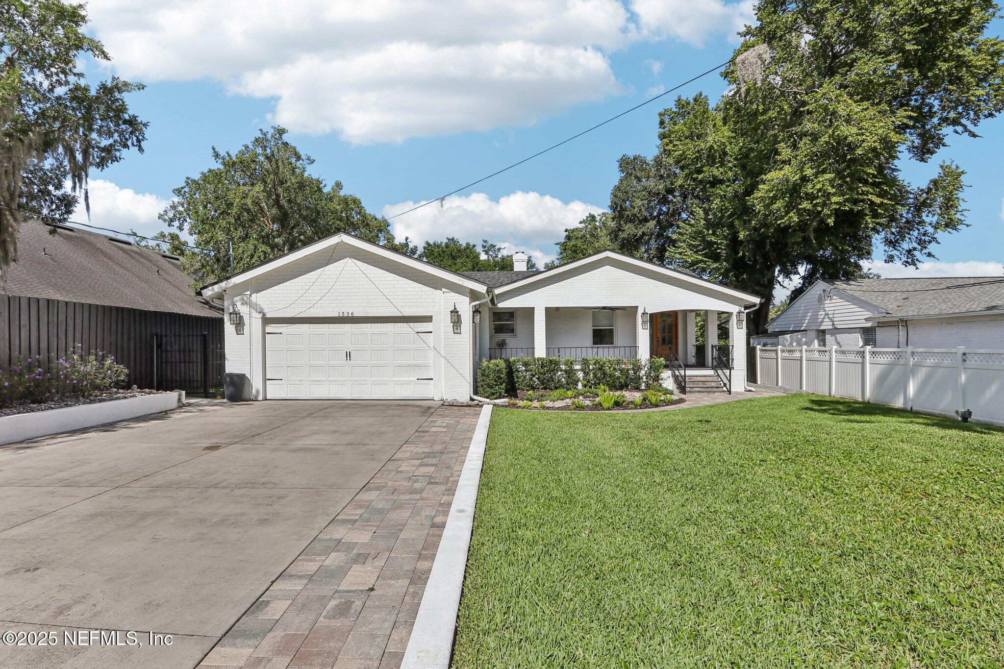 1536 Mayfair Road Jacksonville, FL 32207 - Photo 1 of 58 a front view of house with yard and green space
