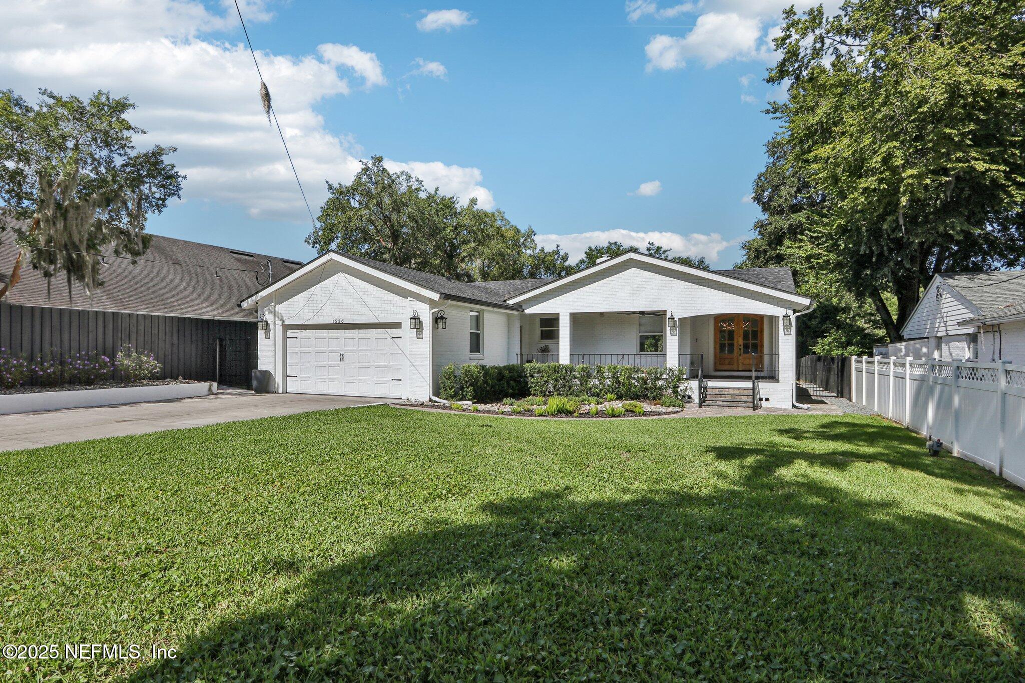 1536 Mayfair Road Jacksonville, FL 32207 - Photo 3 of 58 a front view of house with yard and green space