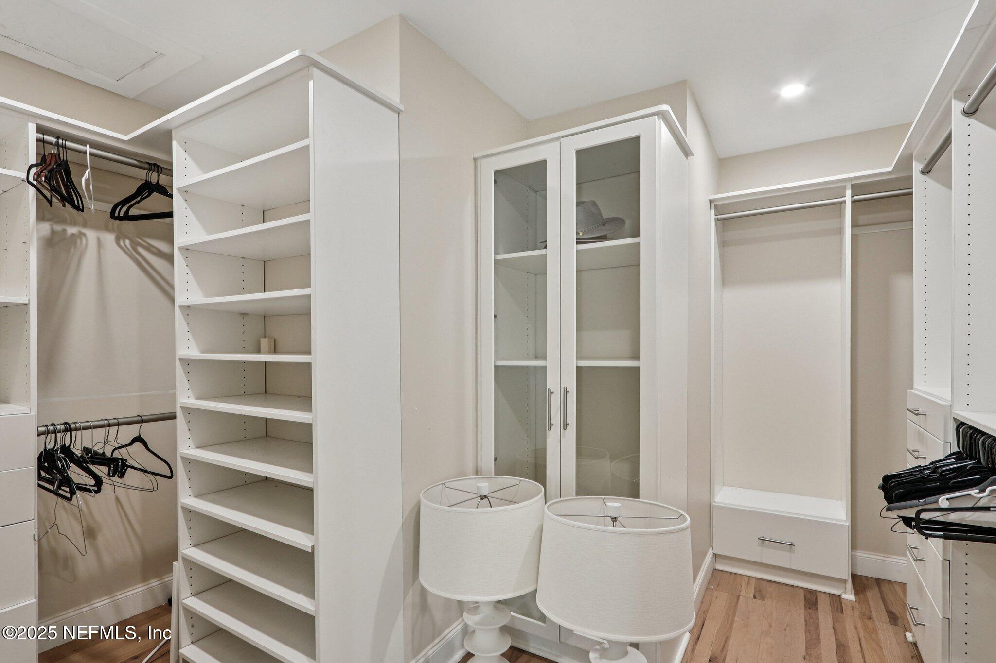 1536 Mayfair Road Jacksonville, FL 32207 - Photo 31 of 58 a white toilet sitting next to a bathroom sink and a tub