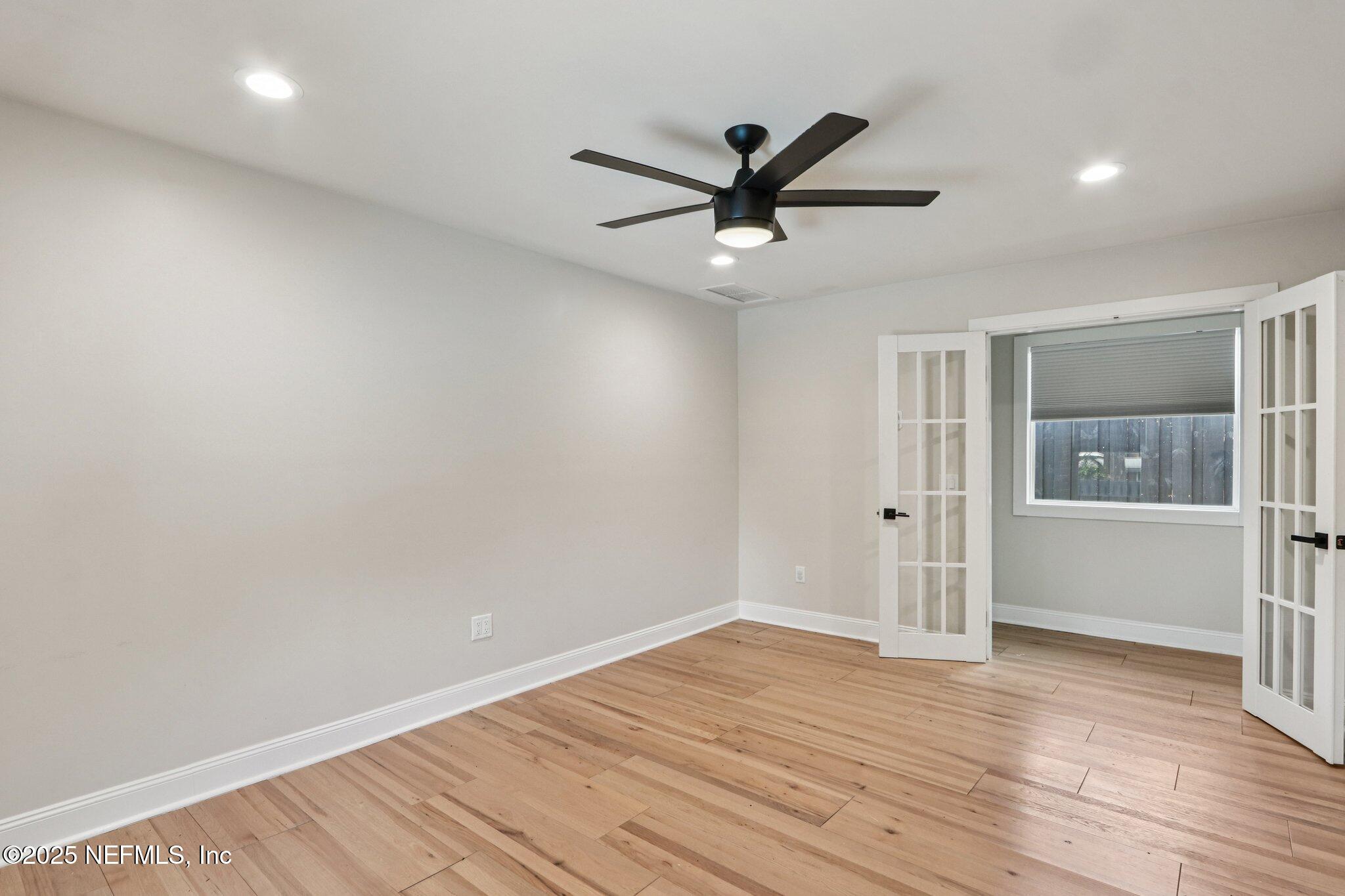 1536 Mayfair Road Jacksonville, FL 32207 - Photo 38 of 58 a view of a big room with wooden floor and windows
