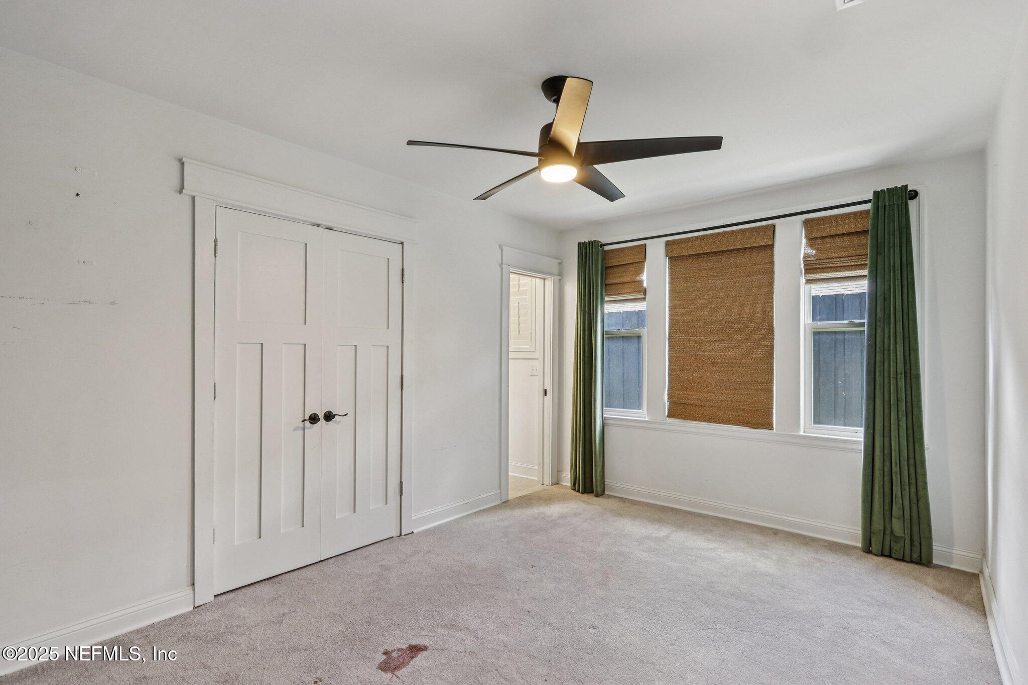 1536 Mayfair Road Jacksonville, FL 32207 - Photo 40 of 58 a view of empty room with ceiling fan