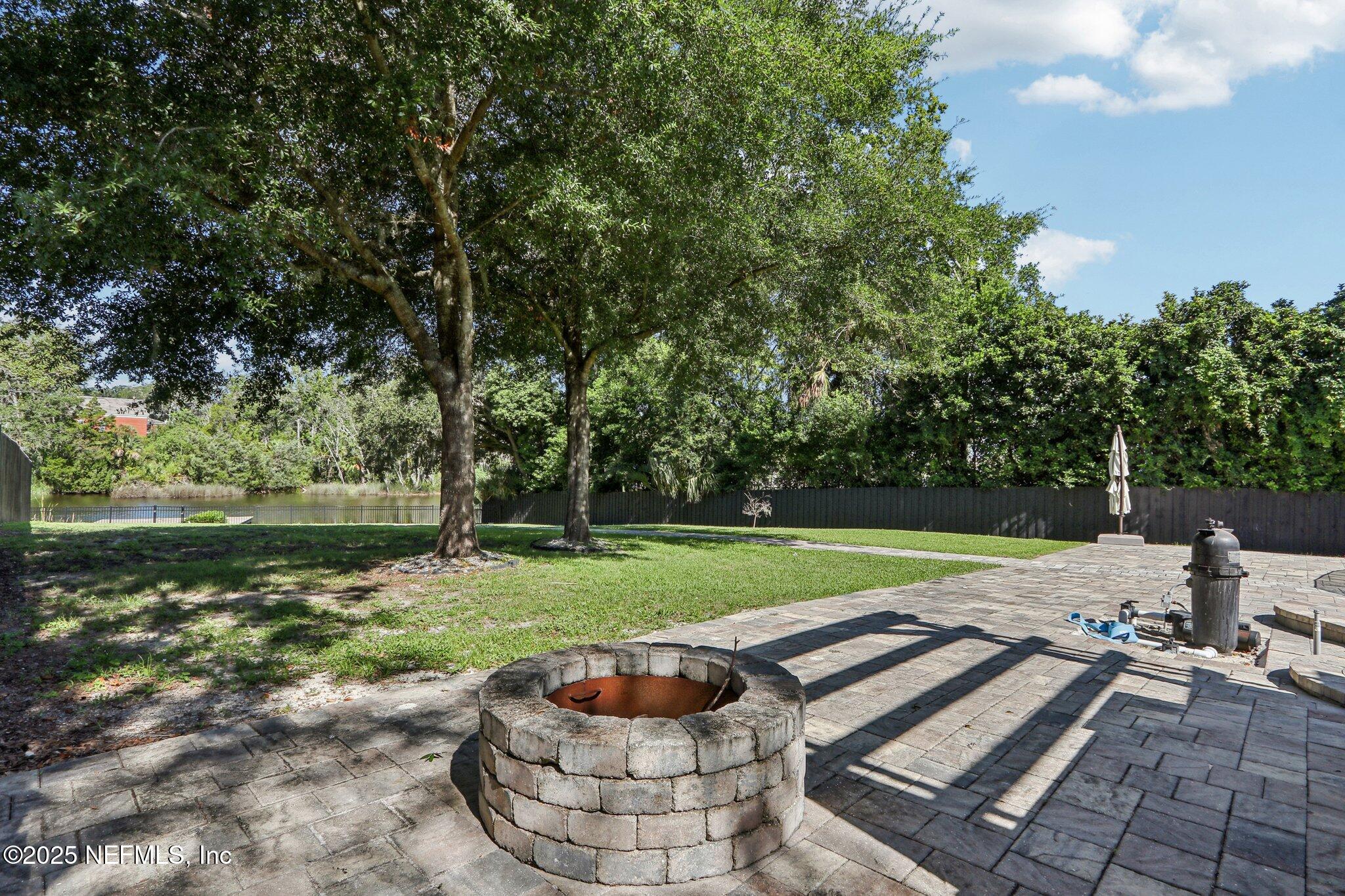 1536 Mayfair Road Jacksonville, FL 32207 - Photo 46 of 58 a view of a backyard with sitting area
