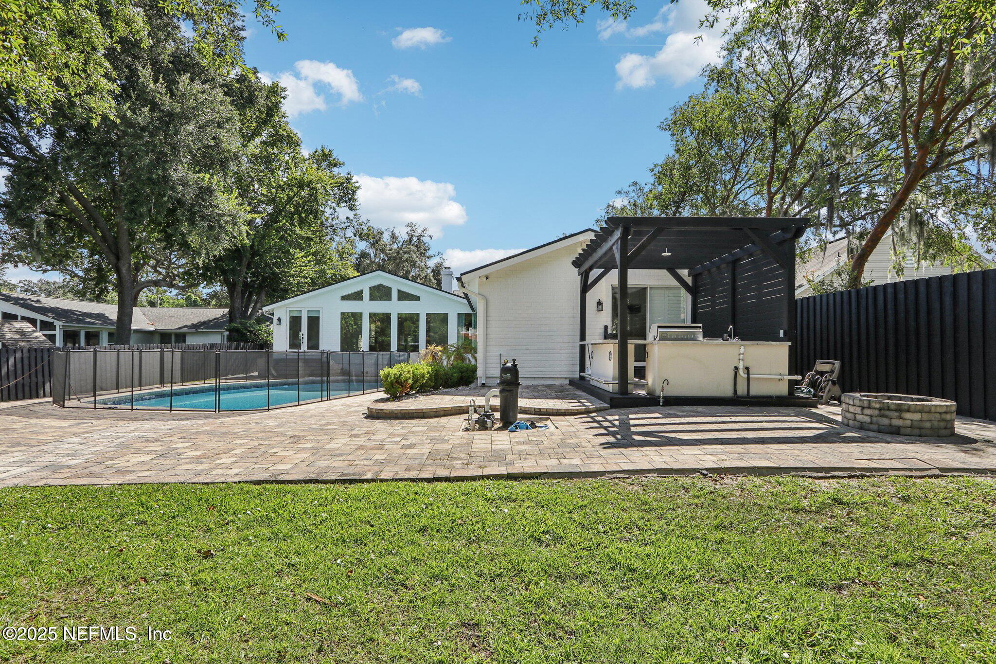 1536 Mayfair Road Jacksonville, FL 32207 - Photo 49 of 58 a front view of a house with garden