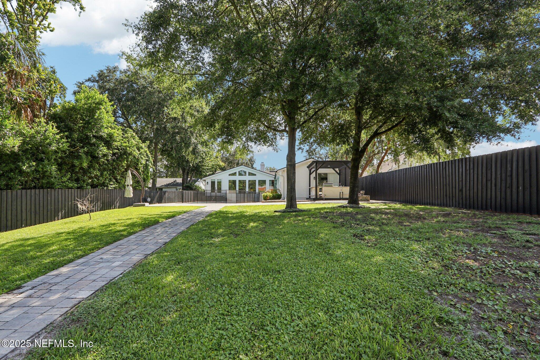 1536 Mayfair Road Jacksonville, FL 32207 - Photo 55 of 58 a view of a garden with a tree