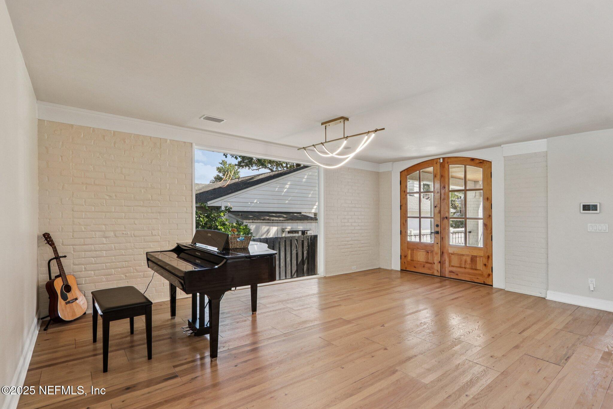 1536 Mayfair Road Jacksonville, FL 32207 - Photo 9 of 58 a view of a livingroom with furniture wooden floor and a window